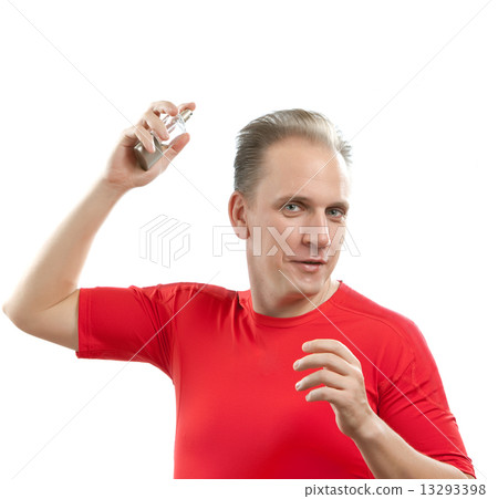 sports man spraying fragrance perfume 13293398