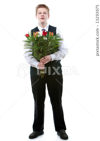 The pupil of the senior classes in a school uniform with a bouquet of flowers.. The pupil of the senior classes in a school uniform with a bouquet of flowers.. 13293975