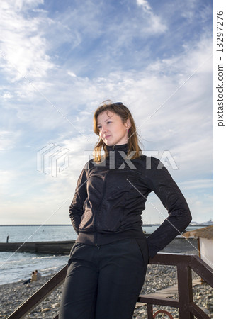 Beautiful girl on the beach. 13297276