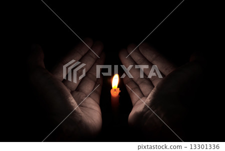 Candle light in hand, Hope concept Candle light in hand, Hope concept 13301336