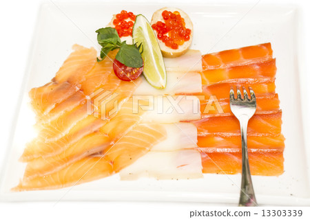 cutting of the fish on the table in a restaurant cutting of the fish on the table in a restaurant 13303339