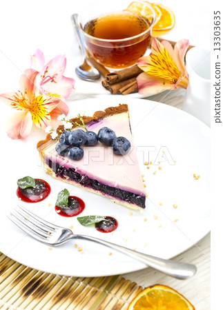 piece of blueberry pie on a table in a restaurant piece of blueberry pie on a table in a restaurant 13303635