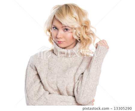 Beautiful, young woman in a warm sweater Beautiful, young woman in a warm sweater 13305290