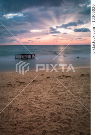 Tropical Beach with Empty Cage in the Sea at Sunset Tropical Beach with Empty Cage in the Sea at Sunset 13306020
