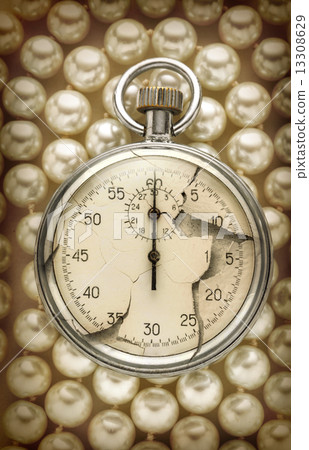 Cracked stopwatch on white pearl 13308629