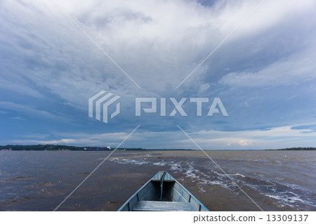 The Meeting of Waters (Portuguese: Encontro das Aguas) over boat 13309137