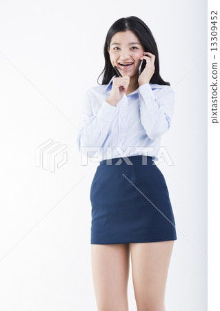 Young lady of mobile phone smartphone and OL clerk Young lady of mobile phone smartphone and OL clerk 13309452