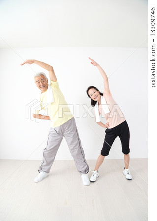 A couple exercising 13309746