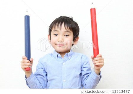 Child with big pencil (infant) 13313477
