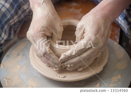 Hands of a potter Hands of a potter 13314560