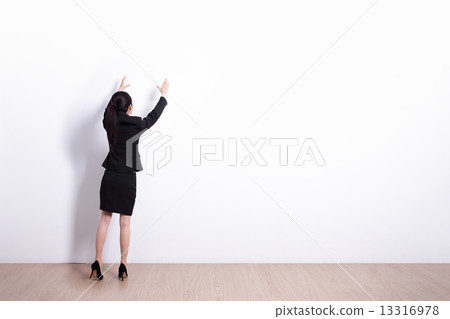 business woman holding something 13316978
