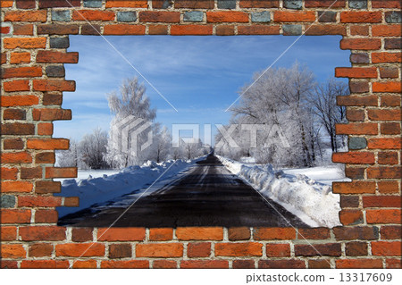 broken brick wall and view to Winter highway 13317609