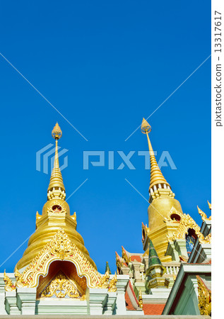 Golden pinnacle of thai temple Golden pinnacle of thai temple 13317617