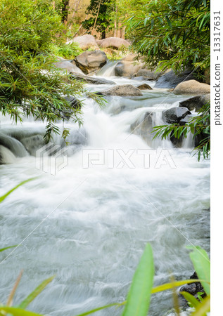 Waterfall on the mountain. 13317631