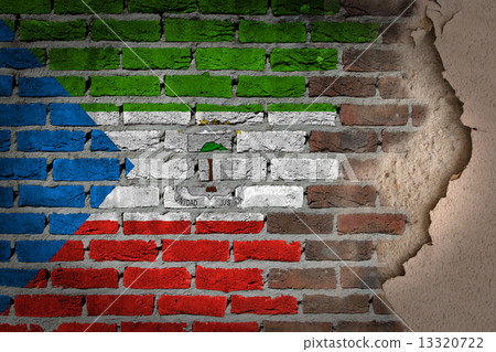 Dark brick wall with plaster - Equatorial Guinea 13320722