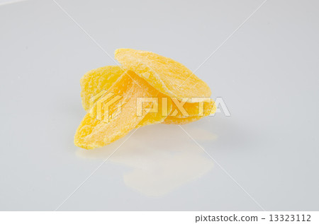 preserved mango fruits Snack on a Background preserved mango fruits Snack on a Background 13323112