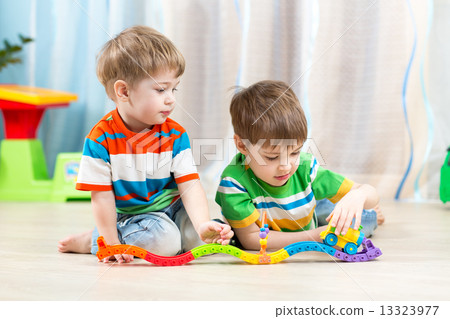 kids playing rail road toy kids playing rail road toy 13323977