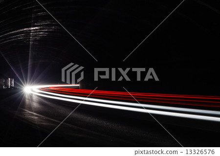 Light tralight trails in tunnel. Long exposure photo in a tunel 13326576