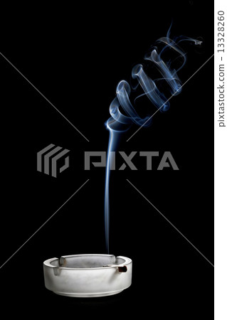Cigarettes and smoke in ash-tray Cigarettes and smoke in ash-tray 13328260