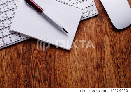 Pen and Notes with Keyboard and Mouse on Table 13329950