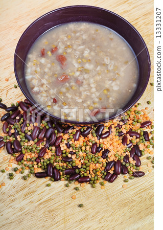 top view of beans soup in bowl on plate 13331207