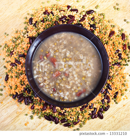 above view of beans soup in bowl on plate 13331210
