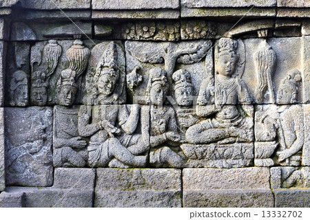 Bass-relief on the wall in Borobudur temple Bass-relief on the wall in Borobudur temple 13332702