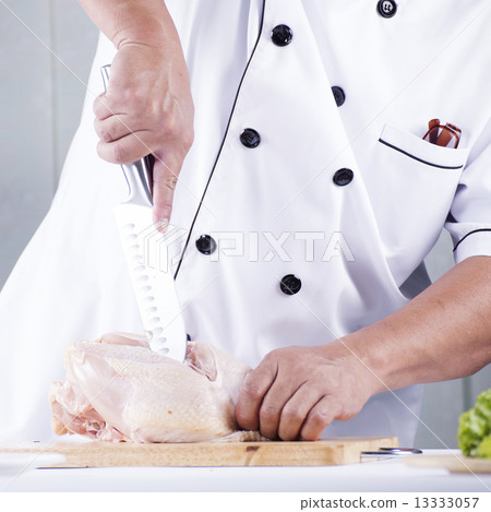 Chef prepared chopping raw chicken 13333057
