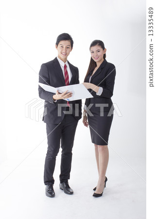Man and woman with a file 13335489