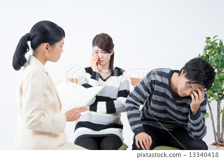 Business woman and young couple 13340418