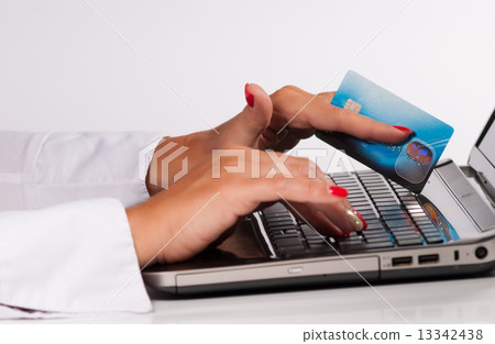 Credait card and laptop 13342438