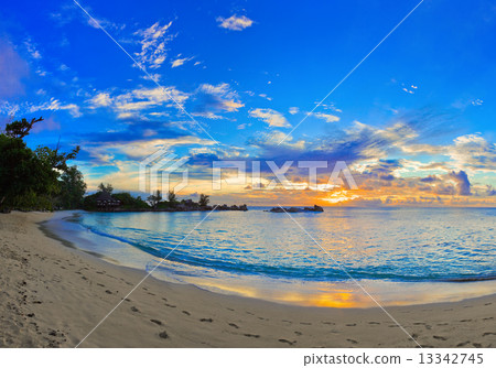 Tropical beach at sunset 13342745