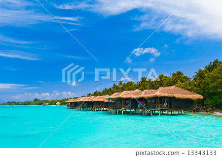 Water bungalows on a tropical island 13343133