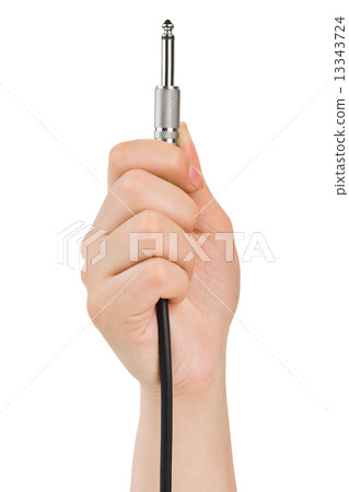 Hand with audio cable 13343724
