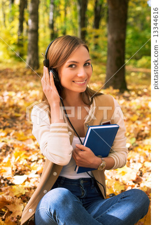 Student sitting and looking at camera Student sitting and looking at camera 13344616