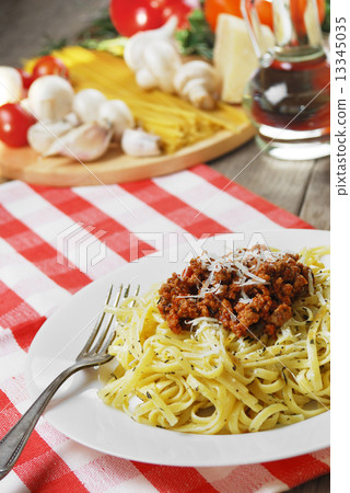 Pasta bolognese on the wooden table Pasta bolognese on the wooden table 13345035