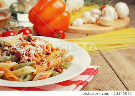 Pasta bolognese on the wooden table Pasta bolognese on the wooden table 13345075