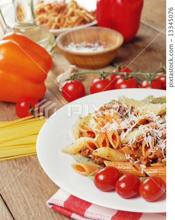 Pasta bolognese on the wooden table Pasta bolognese on the wooden table 13345076