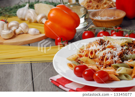 Pasta bolognese on the wooden table Pasta bolognese on the wooden table 13345077