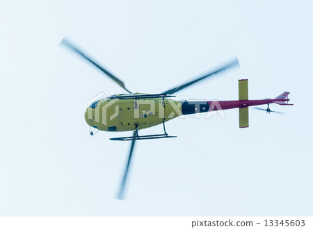Pilot of Eurocopter AS-350 on airshow. Bottom view 13345603