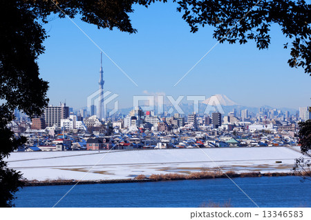 Kawahara and Sky Tree and Mt. Fuji in the Edogawa of a snowy landscape 13346583