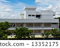 School building with blue sky background 13352175