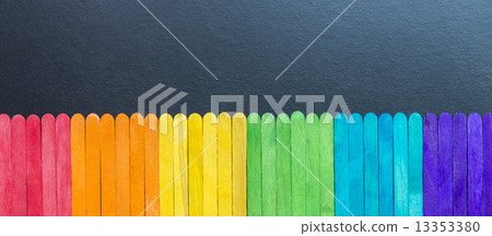 Colorful wooden stripe on black board Colorful wooden stripe on black board 13353380