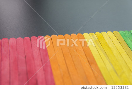 Colorful wooden stripe on black board Colorful wooden stripe on black board 13353381