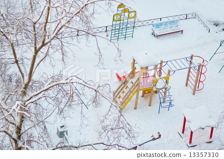 Playground covered with snow 13357310