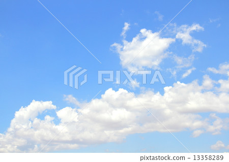Blue sky background with tiny clouds Blue sky background with tiny clouds 13358289