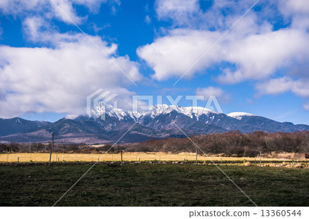 Yatsugatake mountain fall in autumn viewed from Takizawa ranch 13360544