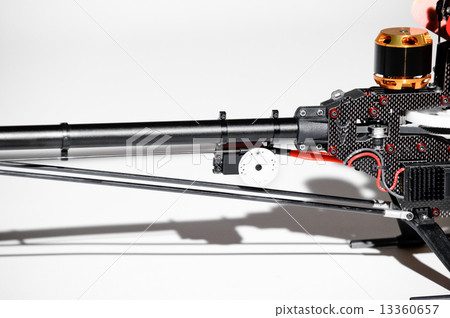 Closeup of radio controlled helicopter parts. 13360657