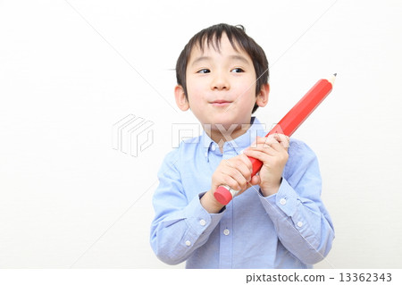 A boy with a big pencil 13362343