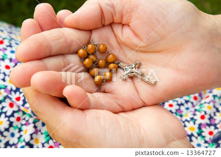 Christian prayer beads in the hands of old woman Christian prayer beads in the hands of old woman 13364727